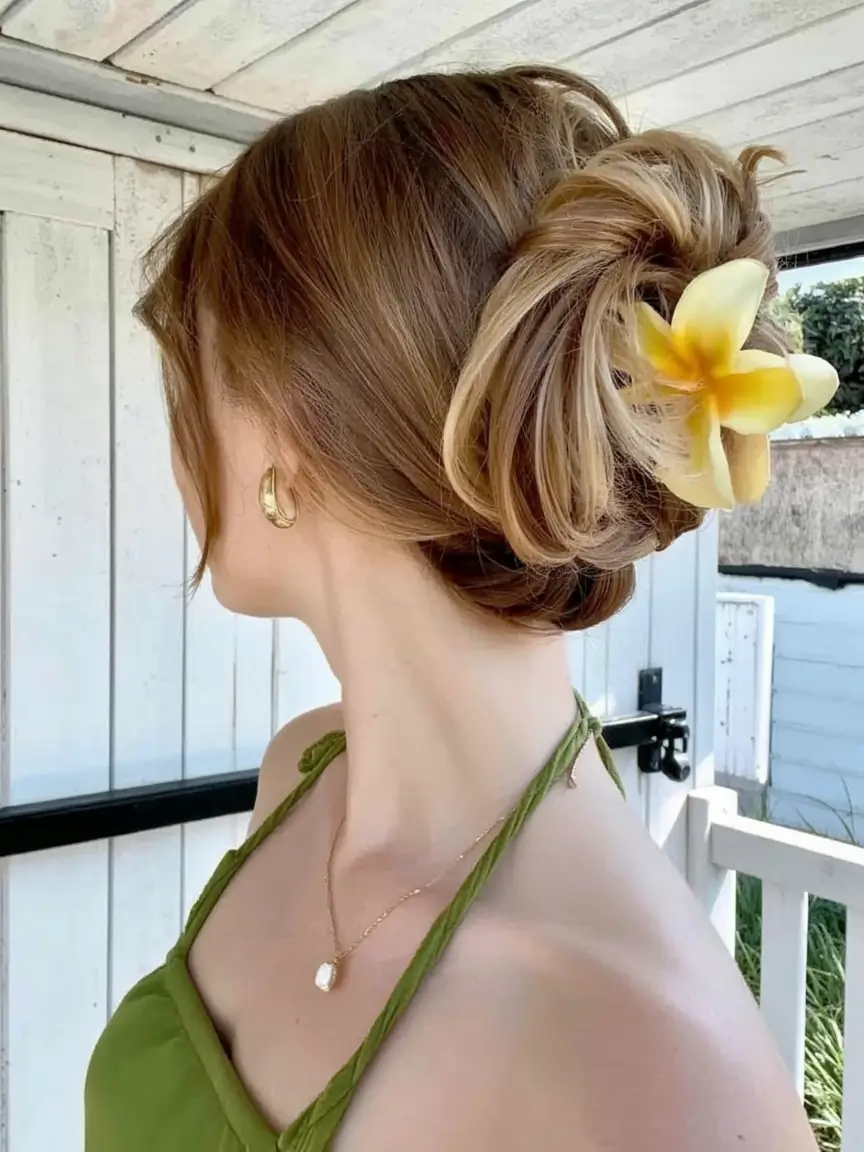 Practical Summer Swimming Hairstyles 2025 Floral Twist Low Bun