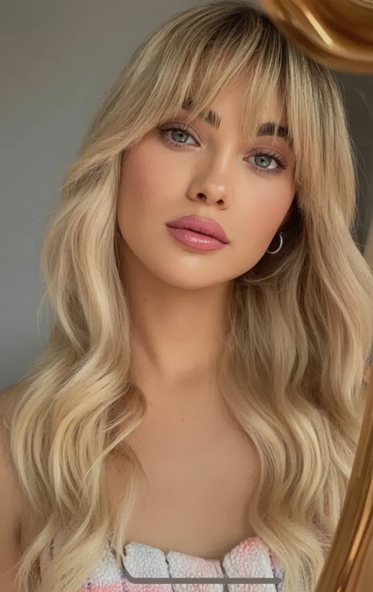 Summer 2025 Long Haircuts: Elegant & Flowing Ideas Barbie Blonde Waves with Full Fringe