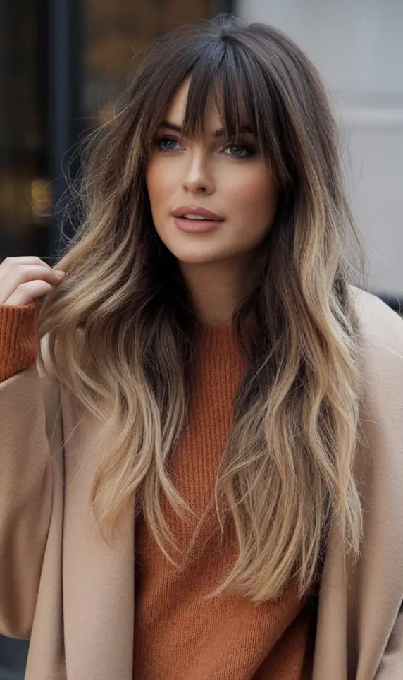 Fall brunette hair color ideas 2025 French Bangs with Almond Blonde Balayage