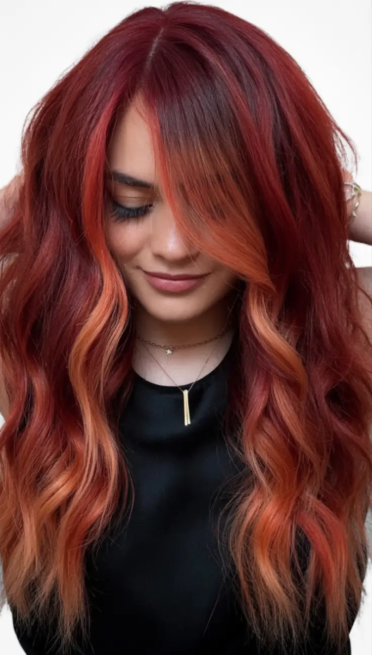 Fall Red Hair Color Ideas for Redheads in 2025 Cherry Cola Waves with Warm Balayage