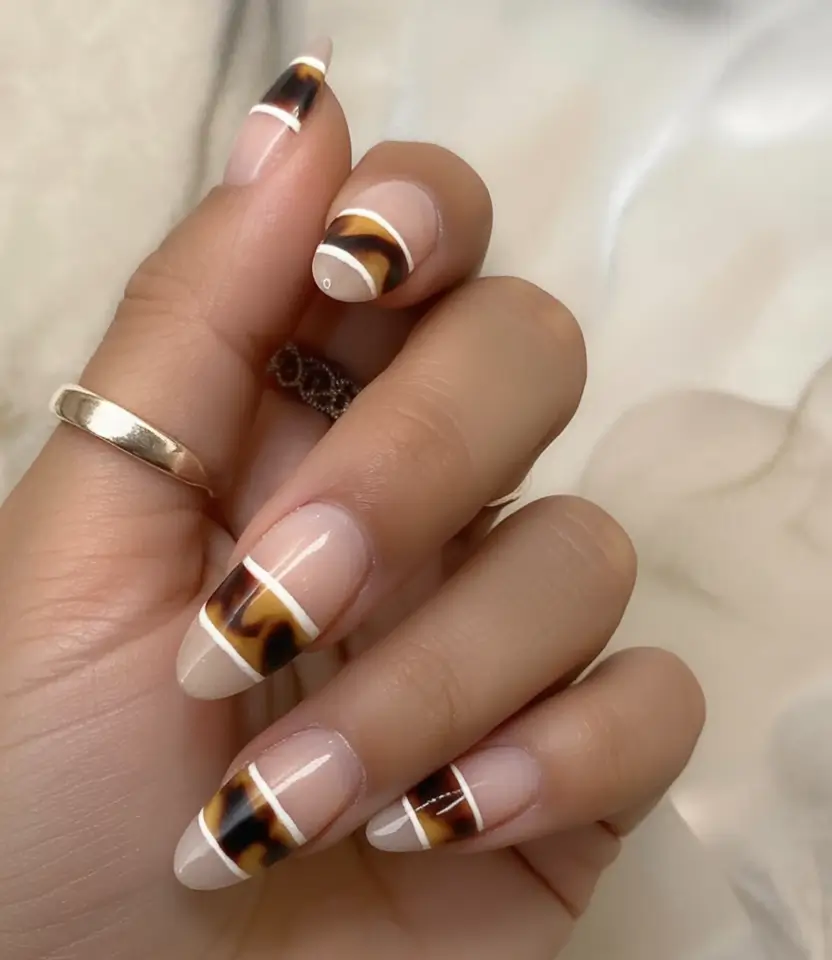 Nail Designs to Try in August 2025 Twisted Candy Stripes