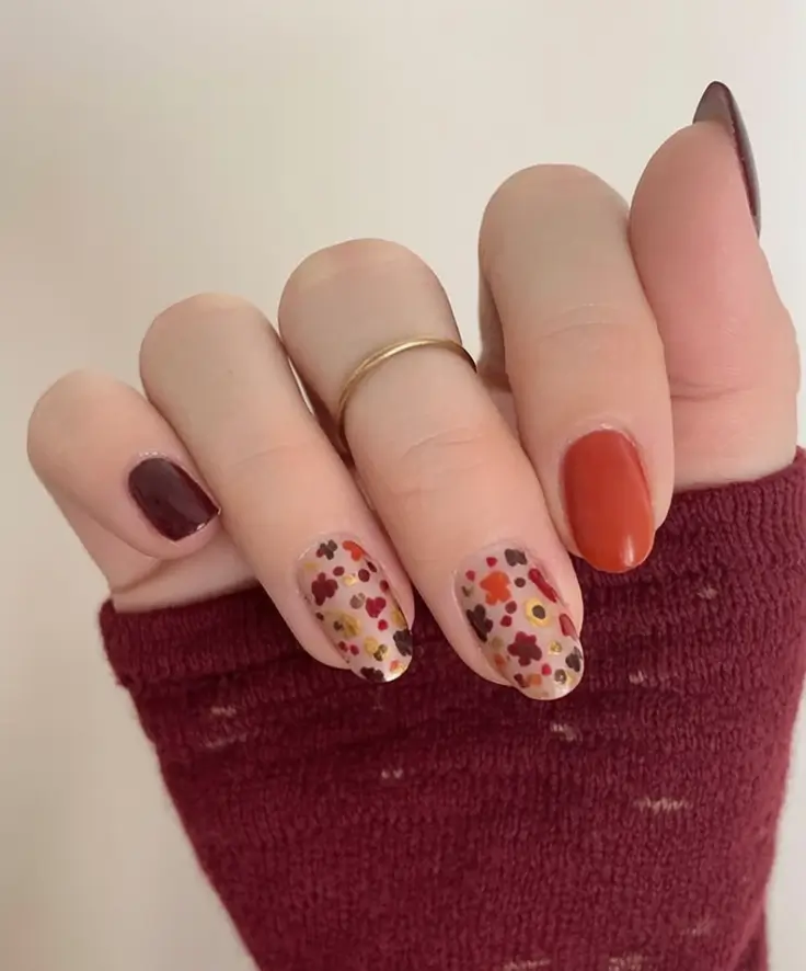 autumn nails color 2025 Muted Botanical Florals with Fall Charm