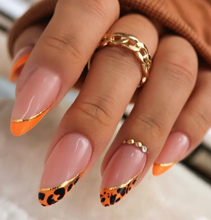 autumn nails color 2025 Gold-Trimmed Leopard Tips in Tangerine