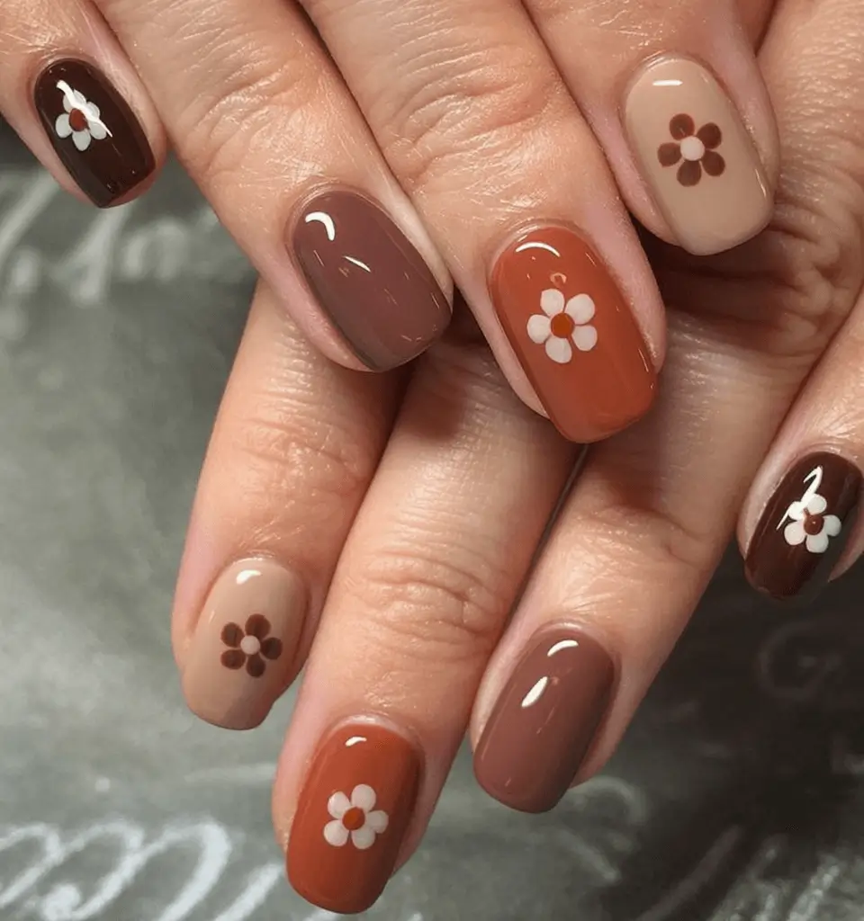 Creative Fall Gel Nail Designs 2025 Retro Daisies in Warm Earth Tones