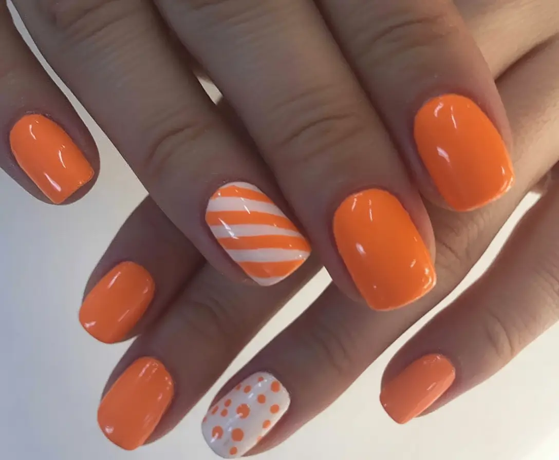 Fall Nail Art Ideas for September 2025 Playful Orange with Candy Accents