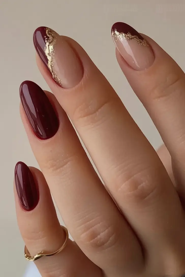 fall nails art ideas 2025 Burgundy Waves with Gold Accent
