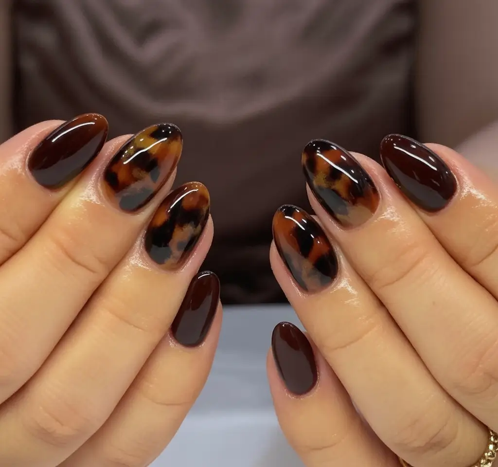 fall nails art ideas 2025 Glossy Tortoiseshell Meets Deep Mocha