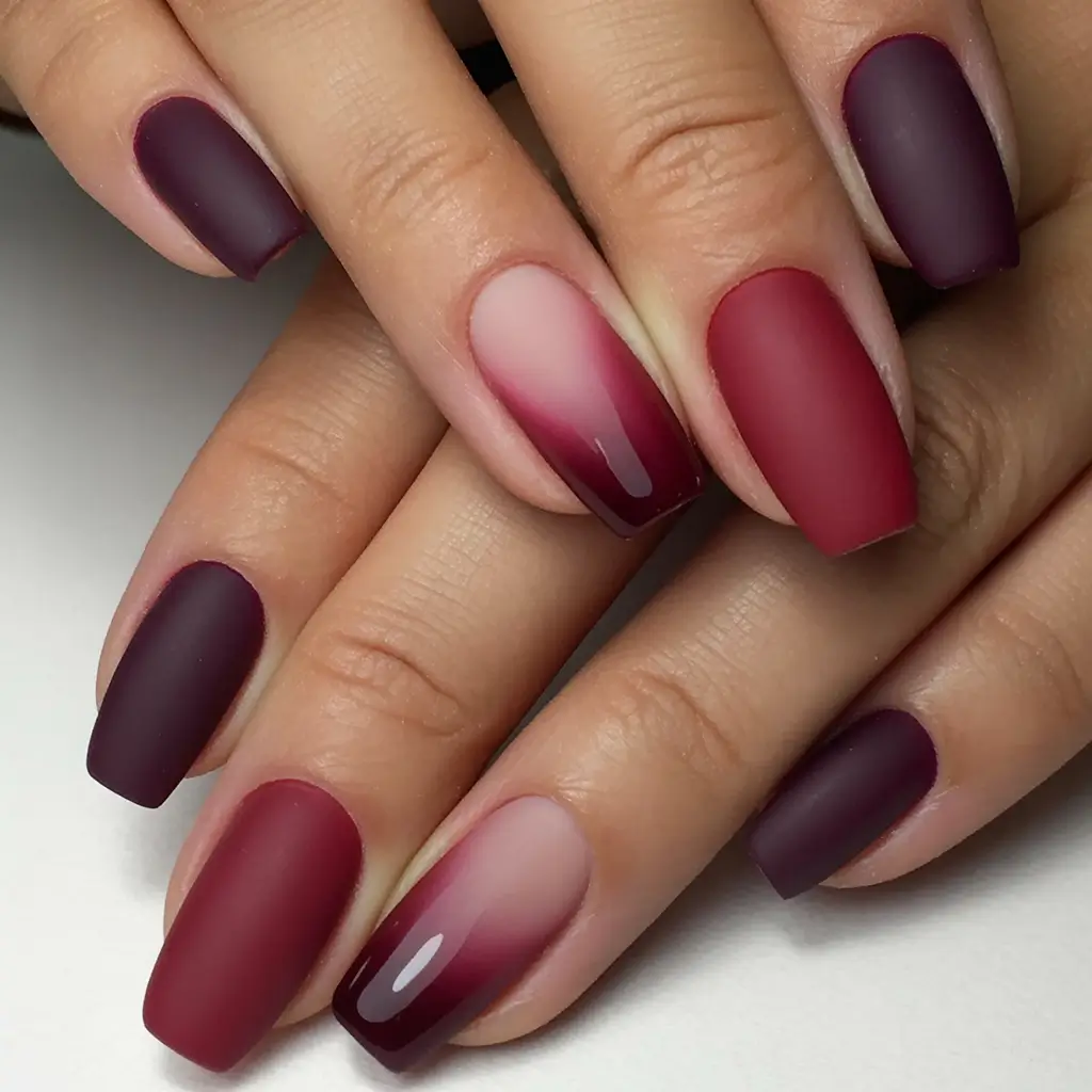 trendy shades of fall nail colors 2025 matte merlot and rose ombre blend