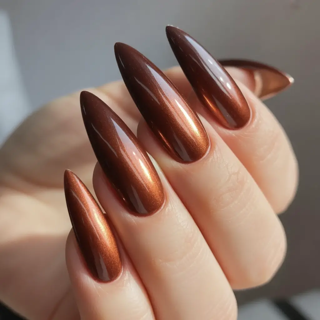 trendy shades of fall nail colors 2025 molten metallic chestnut perfection