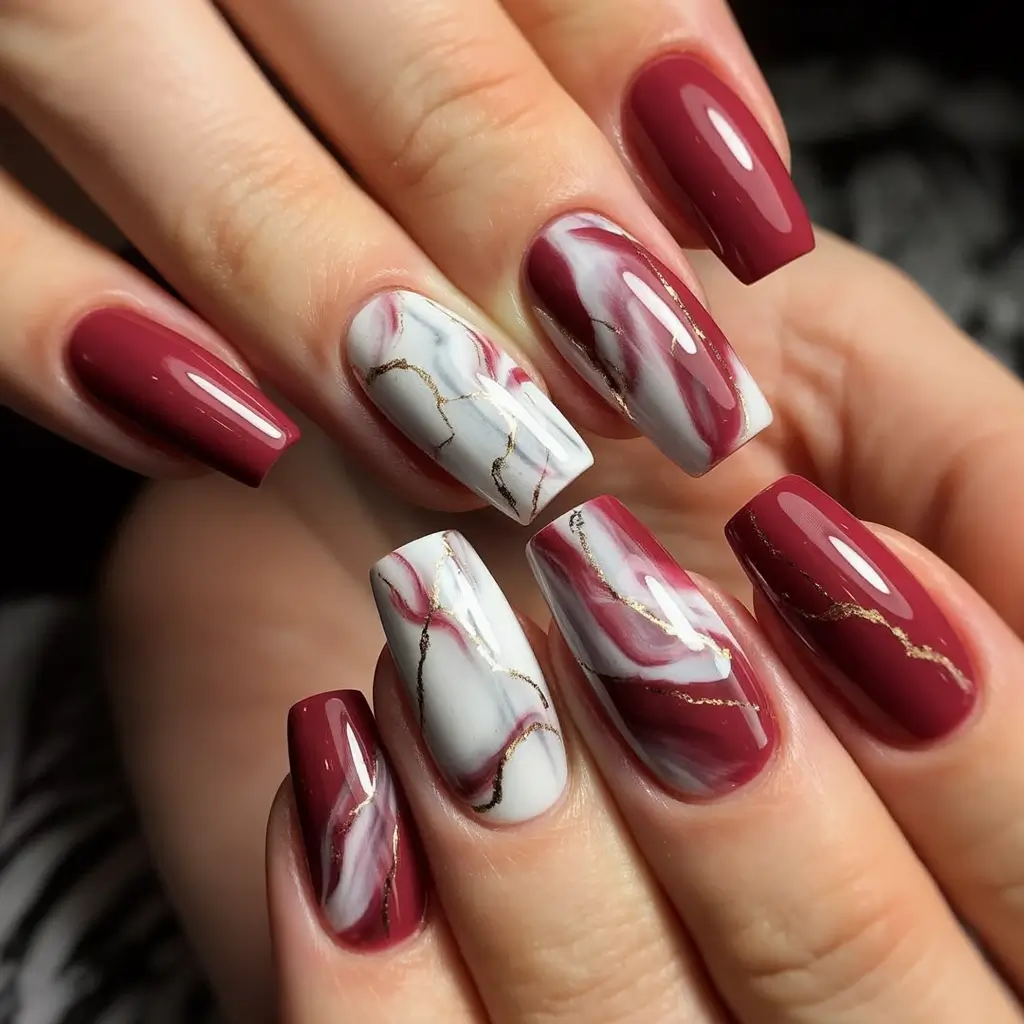 Early Fall Nail Ideas 2025 Marbled Burgundy with Soft Gold Veins