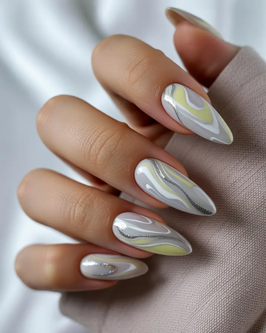 Elegant Neutral Fall Nails 2025 Soft Marble with Silver Accents