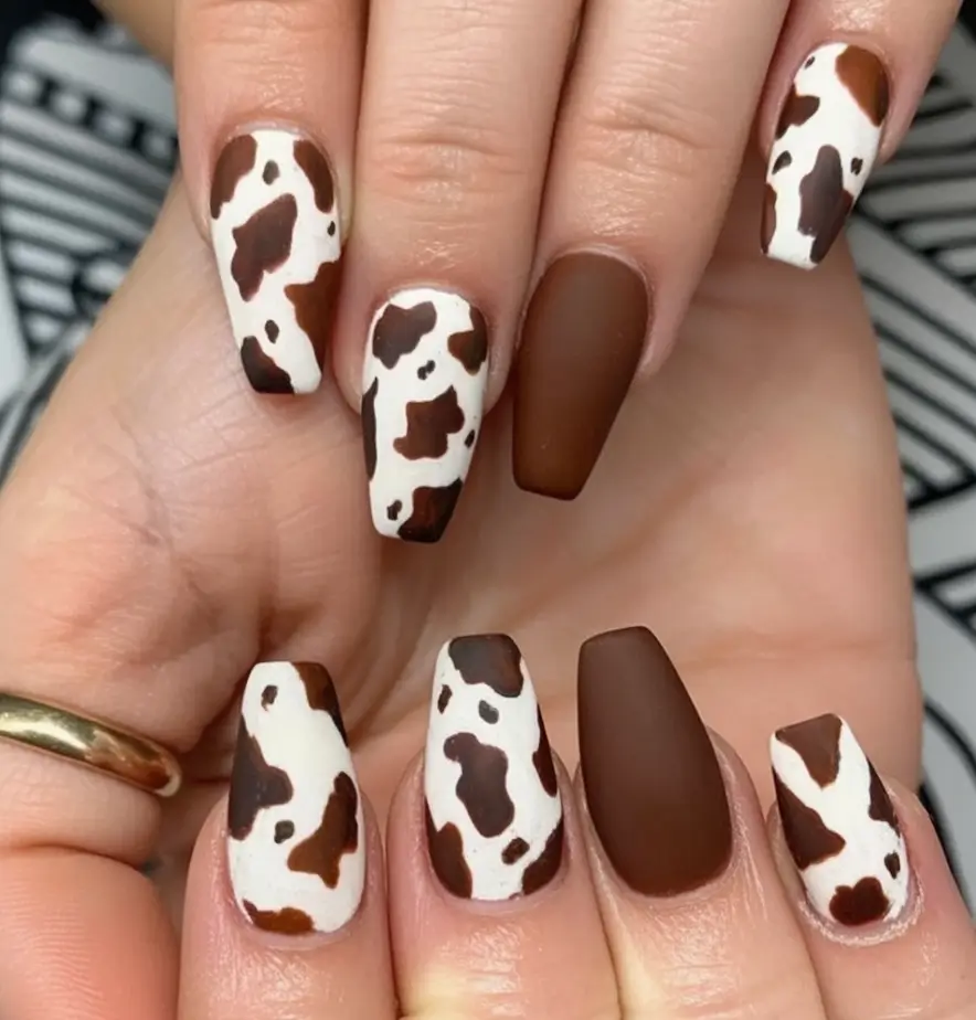 Fall 2025 Nail Color Trend Ideas Matte Cowprint with Deep Chocolate