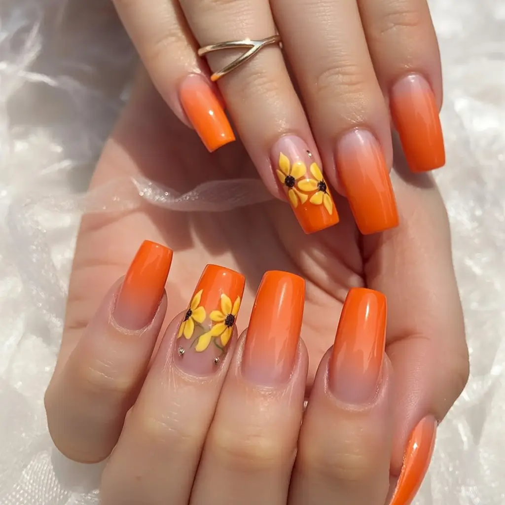 fall coffin nail ideas 2025 Sunset Ombre with Blossoms