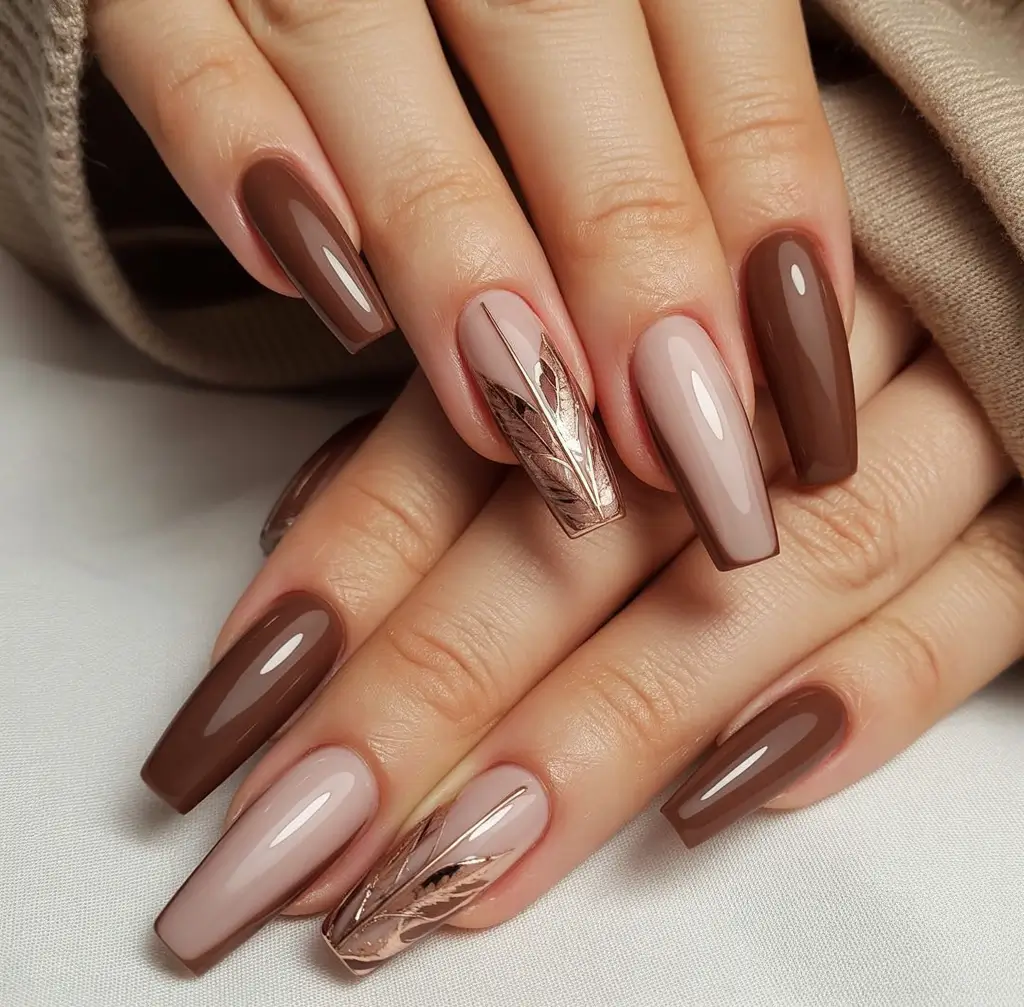 fall coffin nail ideas 2025 Glossy Chestnut with Foiled Leaf Detail