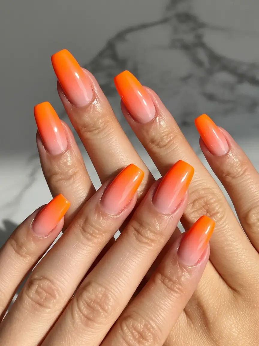 Fall Nail Colors for Medium Skin 2025 – Top Picks Sunset Ombre in Orange and Nude