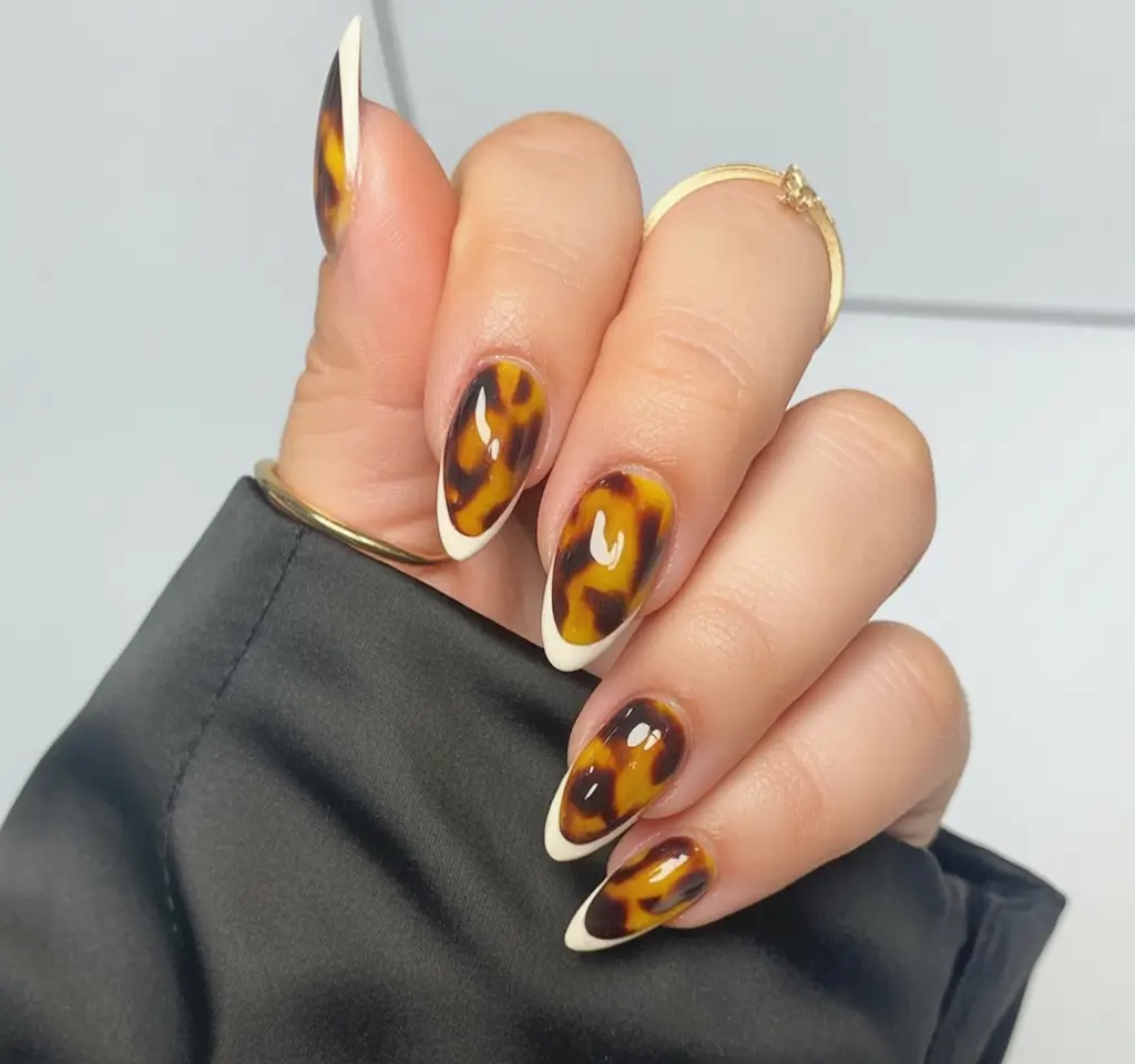 Fall nail designs 2025 Tortoiseshell Almond with Ivory Tips
