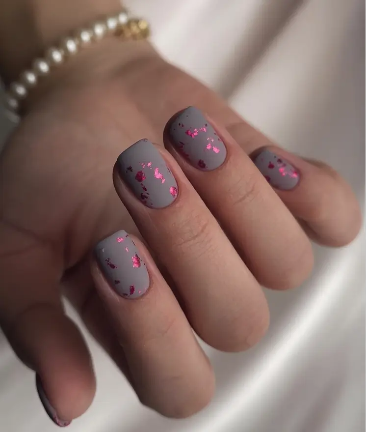 Subtle and Chic Fall Nails 2025 Smoky Grey with Rose Gold Flecks