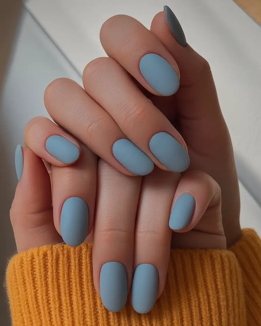 Subtle and Chic Fall Nails 2025 Muted Blue Matte Oval