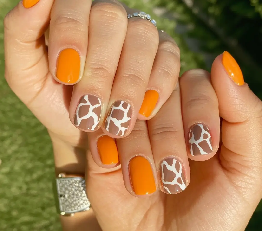 Top Short Fall Nail Trends 2025 Safari Orange and Giraffe Neutrals