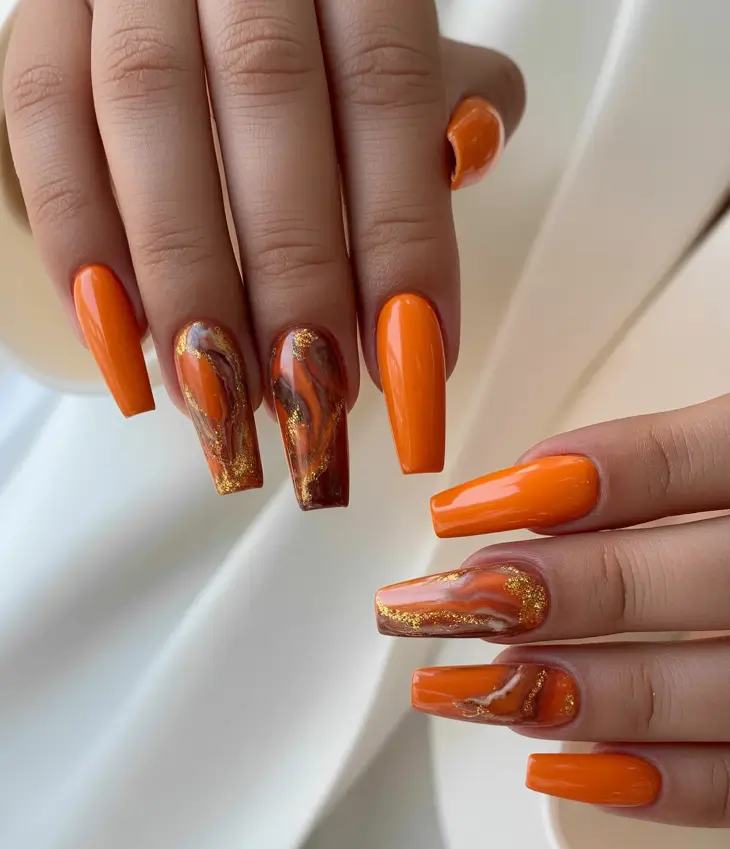 Fall Nail Color Inspo for November 2025 Fiery Orange Marble