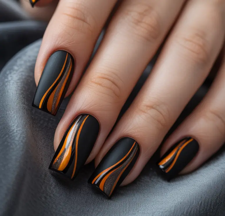 Fall Nail Color Inspo for November 2025 Black and Orange Waves