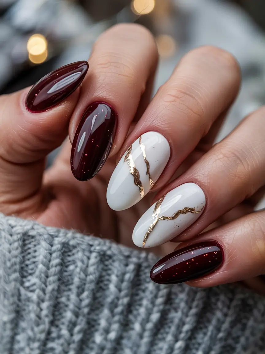 Everyday Cute Winter Nails 2025–2026 Wine and White Marble with Gold Streaks