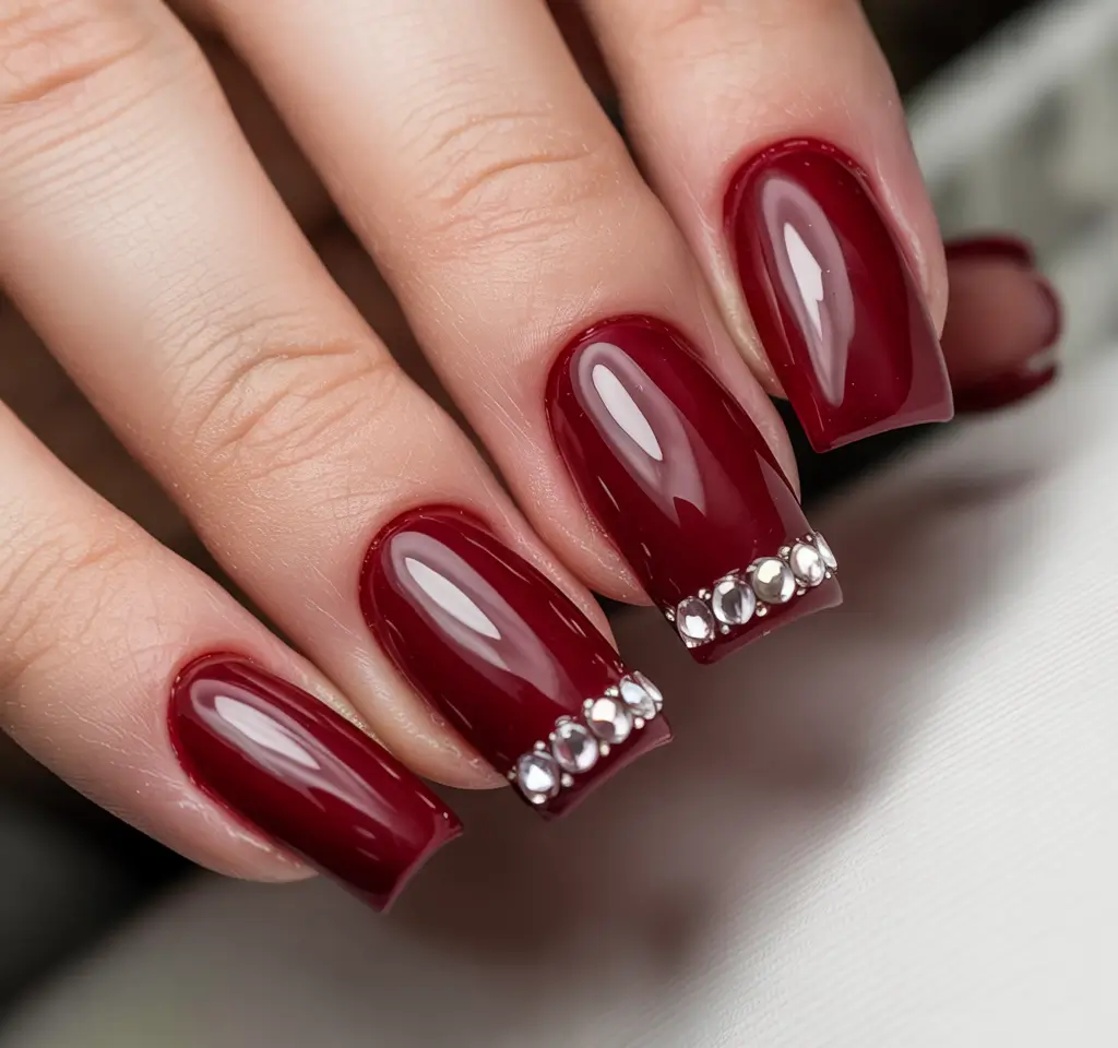 Modern Dark Nail Inspo Winter 2025–2026 Ruby Red With Crystal Edge
